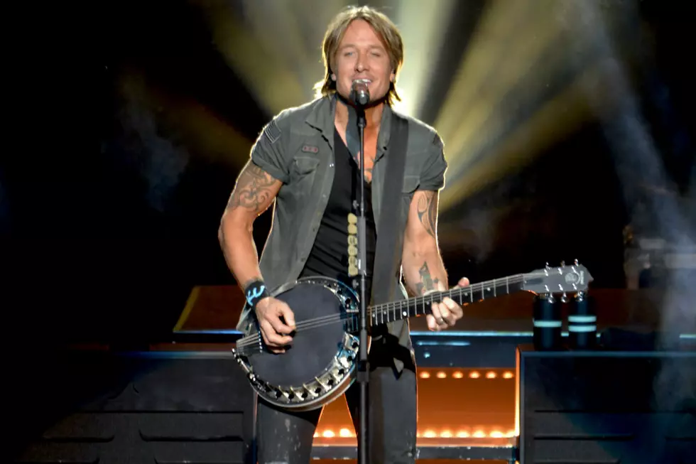 Keith Urban Keeps Cool With Water Slide on Tour [Watch]